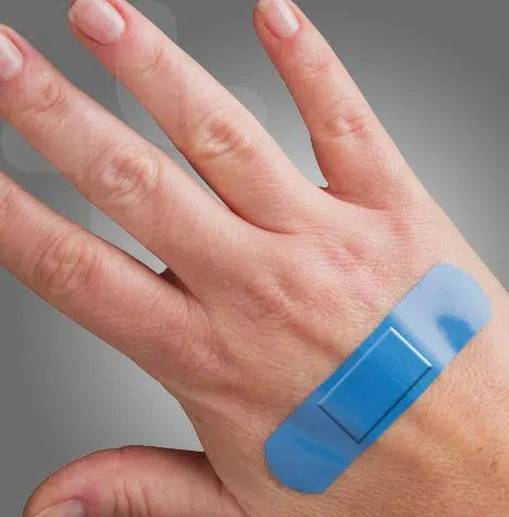 righ hand with blue hospitality bandaid applied
