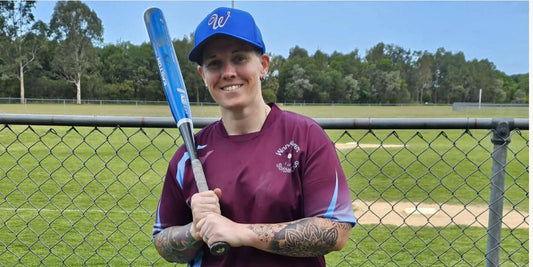 BLOG girl with softball bat at a softball field