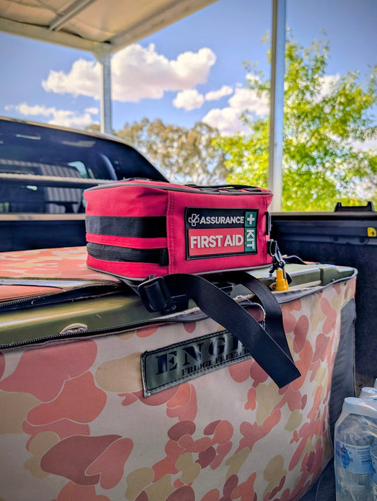 first aid kit in the back of a ute ontop of an engel fridge. Australian built first aid kits by Assurance First Aid Kits