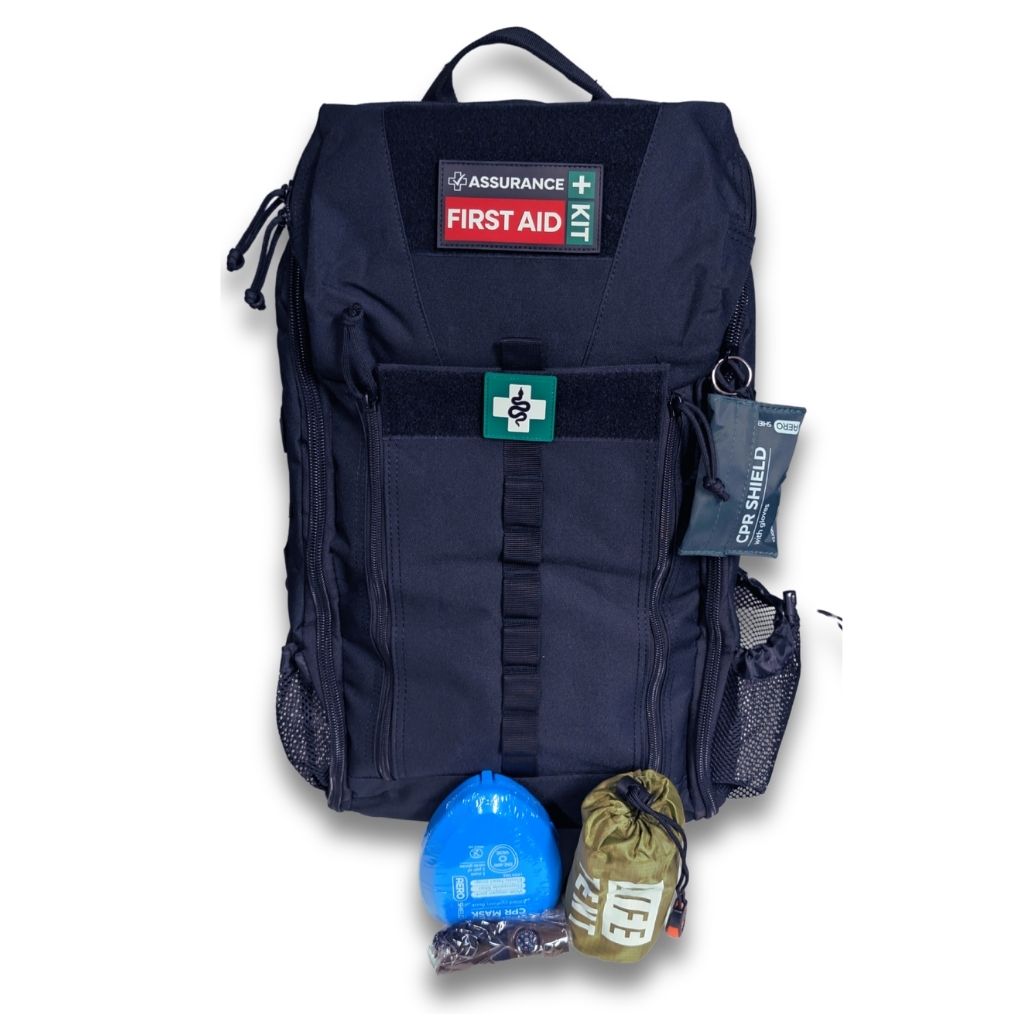 Remote Area Survival First Aid Kit. Black Rugged Tactical Backpack.  Front external view featuring hard cover pocket mask and life tent. Built in Dubbo NSW