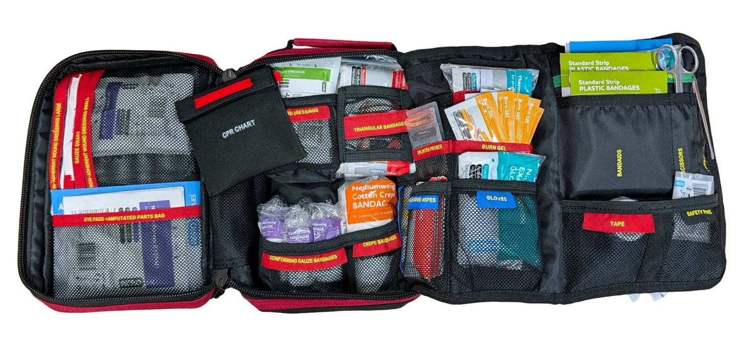 WHS Compliant Red First Aid Kit for 10 persons. Best for office, NDIS houses and receptions. Built in Dubbo by Assurance First Aid Kits. Internal unfolded view of colour coded compartments.