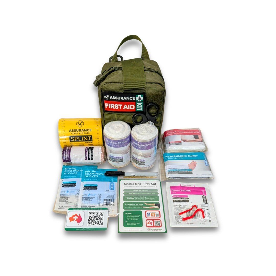 Snake bite kit for Australian snake and spider bites. Internal contents laid out top down , front view of khaki bag Built in NSW by Assurance First Aid Kits