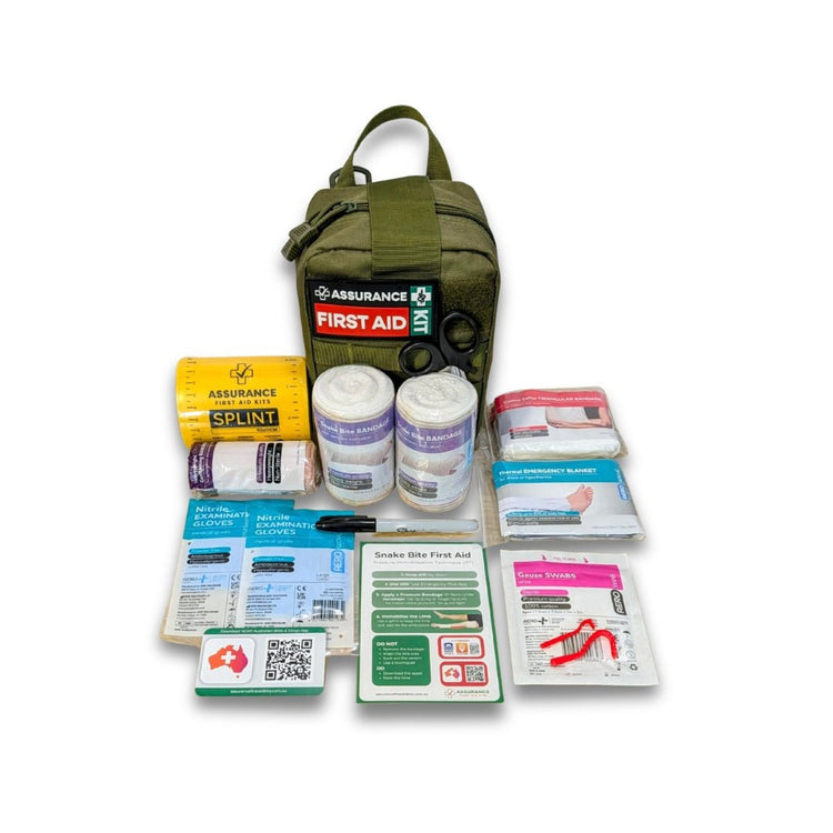 Snake bite kit for Australian snake and spider bites. Internal contents laid out top down , front view of khaki bag Built in NSW by Assurance First Aid Kits