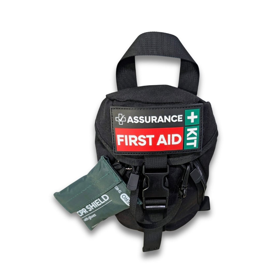 IFAK Hike first aid kit for hiking and bushwalking. Black molle bag with CPR shield and dual quick release zippers. Top down view. Built in Dubbo NSW