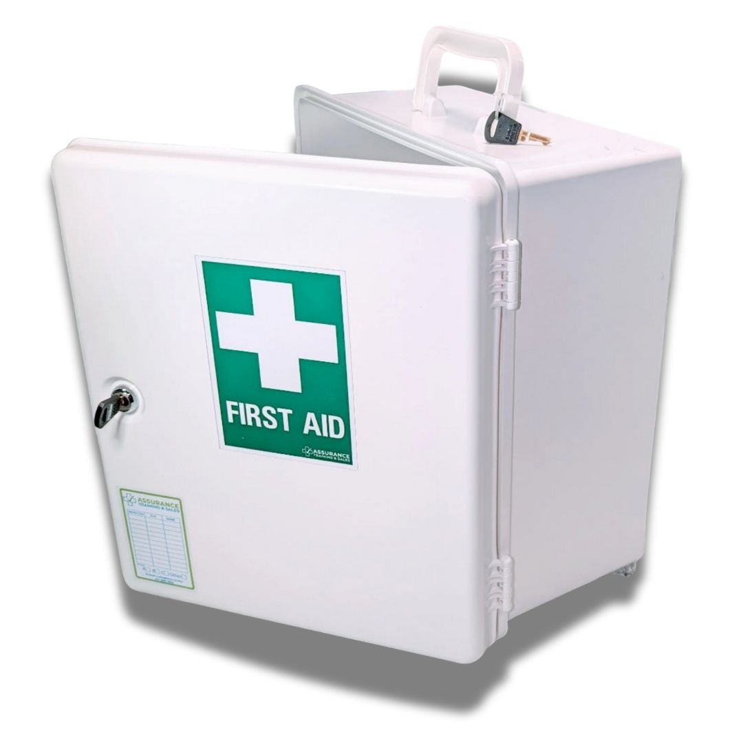 White wall mounted first aid cabinet to suit spaces with 10 persons. WHS compliant. Built in Dubbo by Assurance First Aid Kits. Front view with audit register label and first aid sign on the front door.